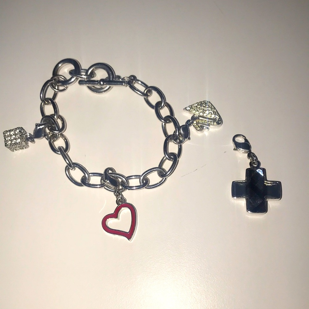SWAROVSKI “RARE” CHARM BRACELET WITH XTRA CHARM